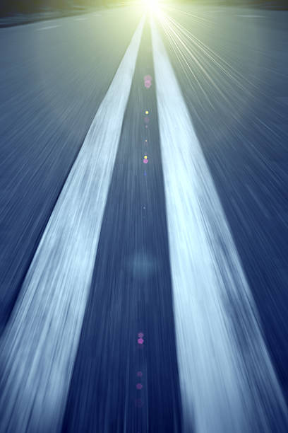 istock double yellow line in the road 179089650