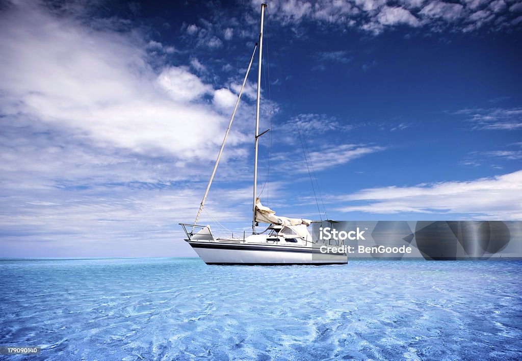 Tropical Waters A Yacht travelling through crystal clear tropical waters Activity Stock Photo