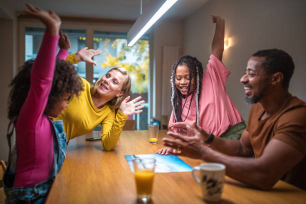 istock Mixed Race Family Enjoying Puzzle Time 1790901859