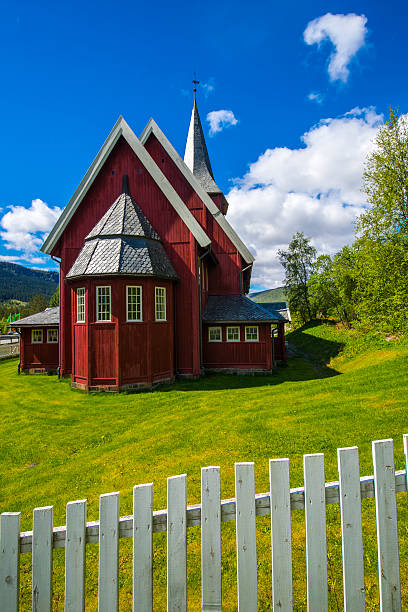 Red Church on Green Yard stock photo