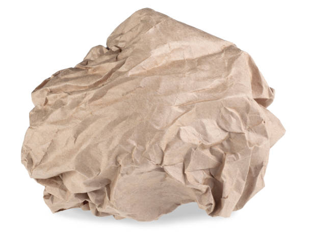 istock Wrapping brown paper crumpled by ball isolated on white background 1790907098