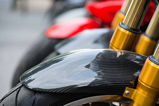 углеродного волокна motorbike отделкой - motorcycle in a row tire wheel стоковые фото и изображения