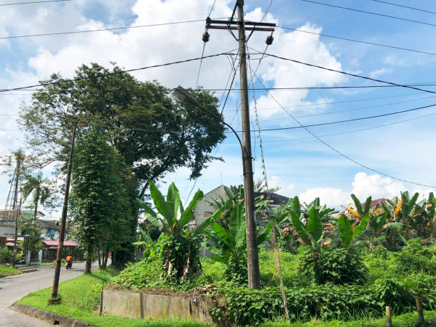 istock Power electric pole with line wire on colored background 1790912180