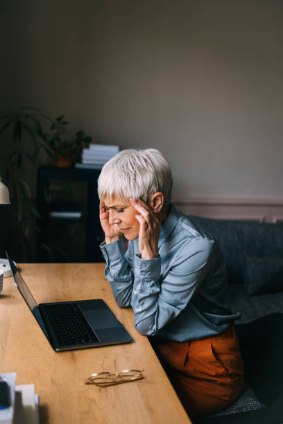 istock Ageless Productivity: Senior Woman Excelling in Home Office Setup 1790914049
