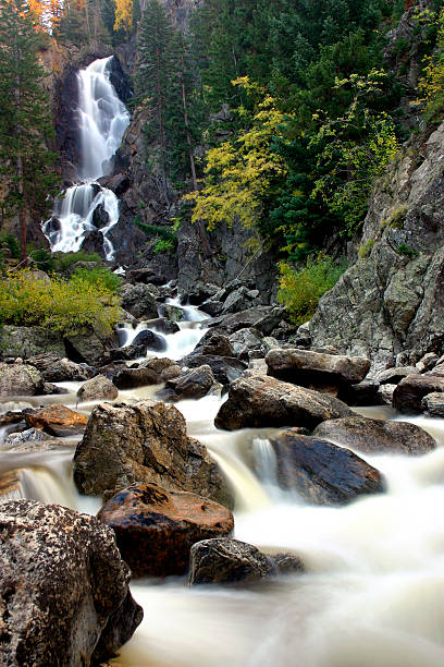 Fish Creek Falls "Fish Creek Falls near Steamboat Springs, Colorado. Shown here in the Fall. Enjoy!" steamboat springs stock pictures, royalty-free photos & images