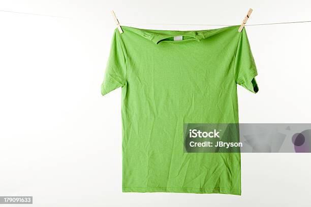 Lime Green Tshirt Stock Photo - Download Image Now - Clothesline, Green Color, Shirt