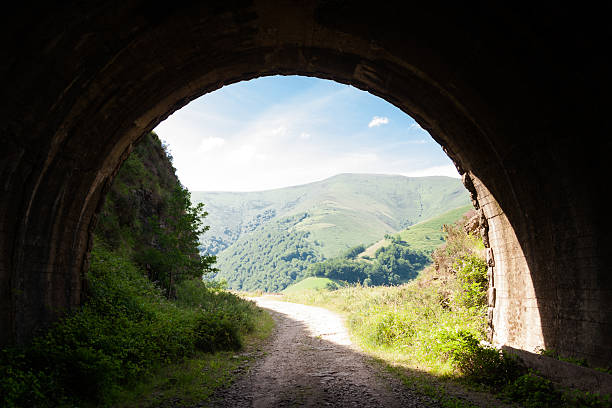 istock Light at the end of an abandoned train tunnel 179093474