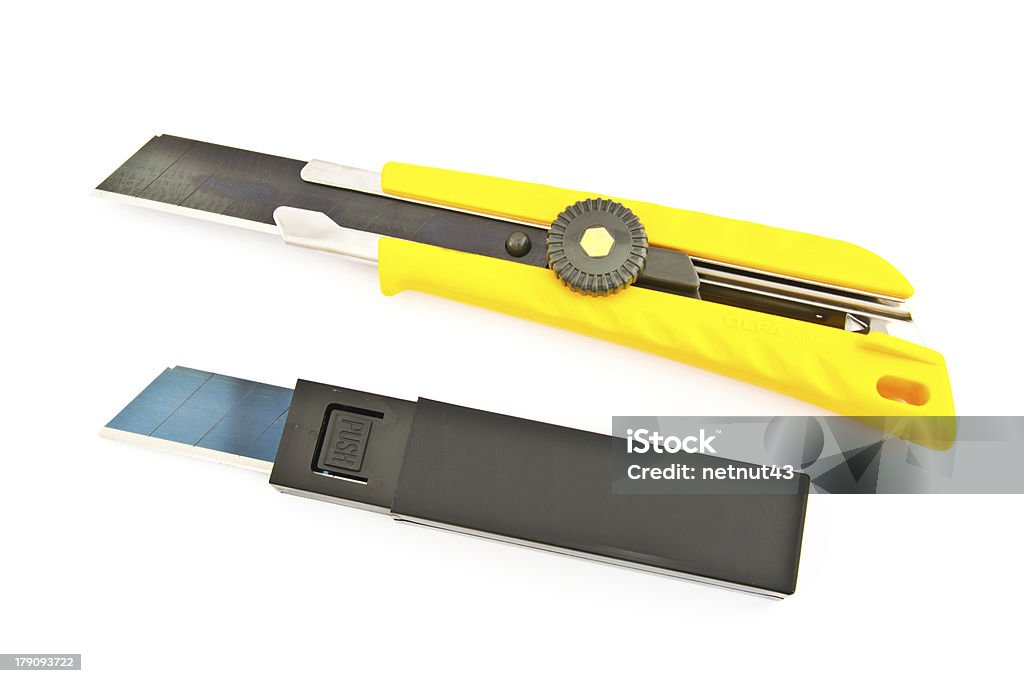 knife cutter The yellow cutter and blade on white background Cutting Stock Photo