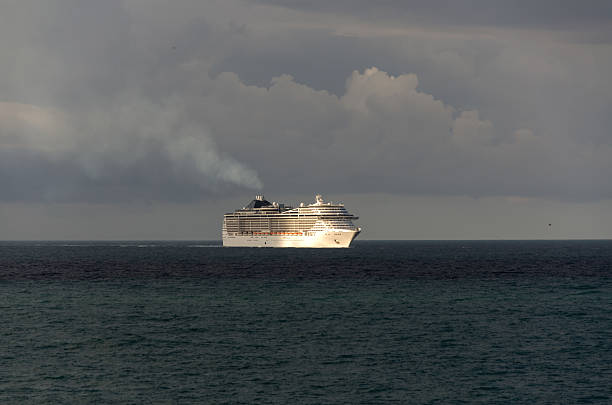 istock cruise ship at sunrise 179093878
