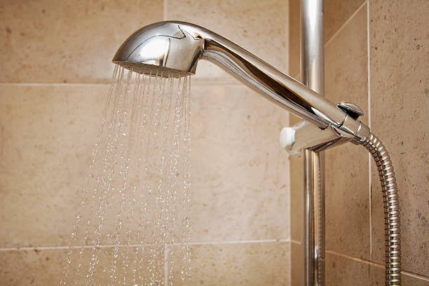 istock Shower head sprinkling water 179094056