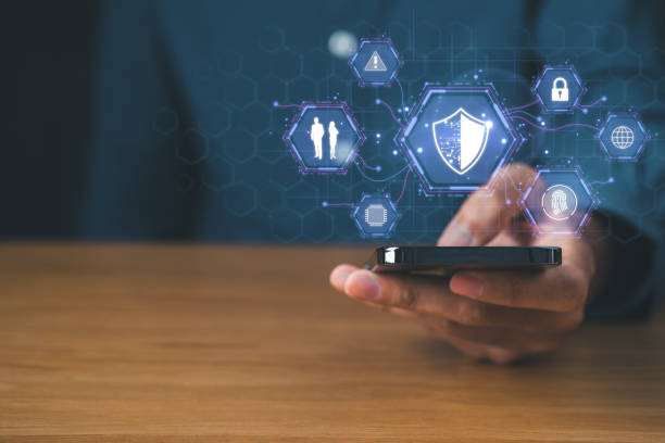 istock Businessman using mobile phone with cyber security icons screen. Digital information technology and  cyber security concept. 1790942250