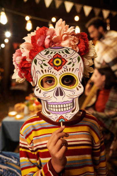 istock Little girl in skull mask 1790946260