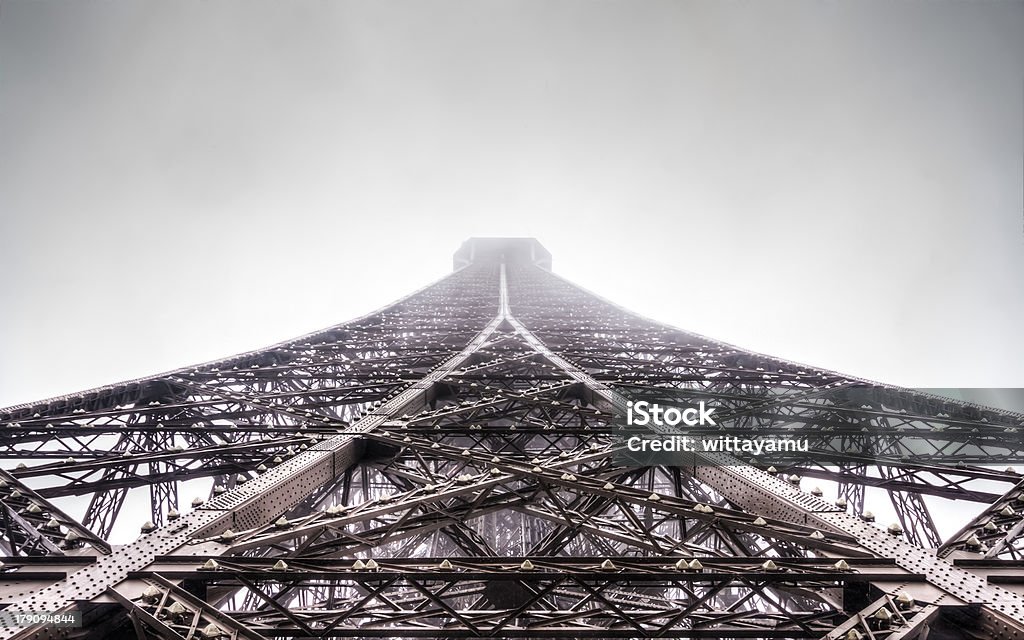 The Eiffel Tower The Eiffel Tower ,La Tour Eiffel, nickname La dame de fer, the iron lady) is an iron lattice tower located on the Champ de Mars in Paris, named after the engineer Gustave Eiffel, whose company designed and built the tower. Architecture Stock Photo