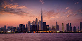 Panoramic view of the illuminated skyline of Dubai Business bay