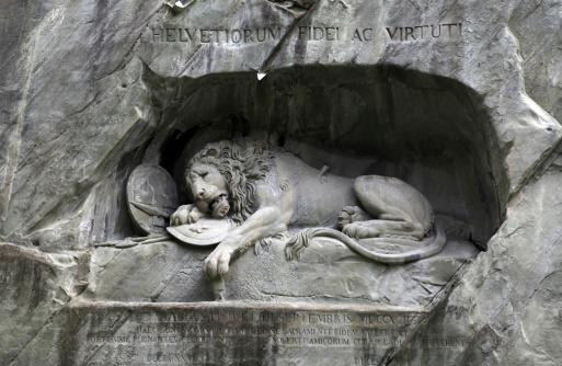 Lion Monument (Löwendenkmal), a historic landmark (1821) in Lucerne, Switzerland, was carved in the rock to honor the Swiss Guards of Lois XVI of France, who defended the Palais des Tuileries in Paris and died in the hands of revolutionaries.