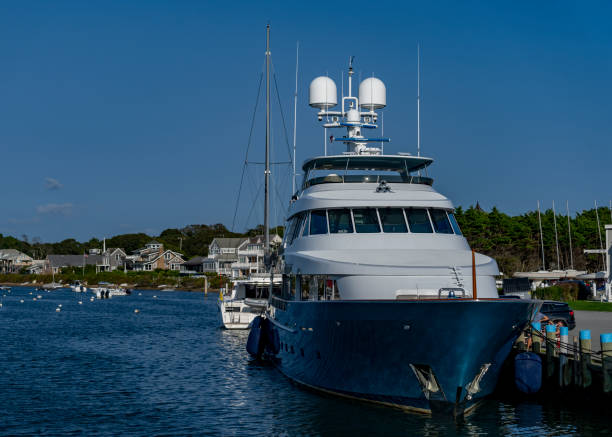 Falmouth harbour on Nantucket Sound.  There are a vast array of yachts and motorboats moored in the marina.