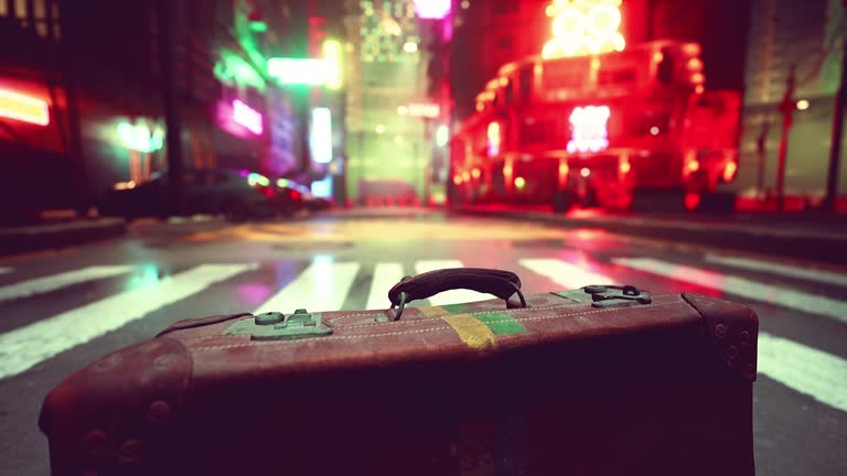 A piece of luggage sitting on the side of a road