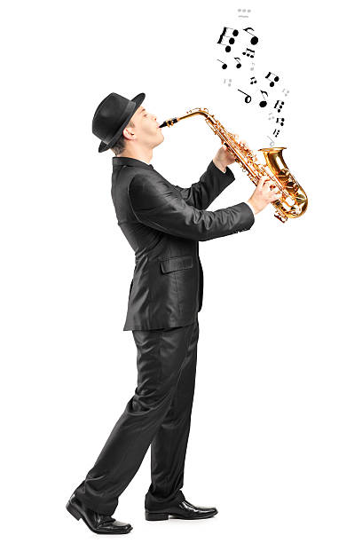 istock Male playing on saxophone and notes coming out 179098126
