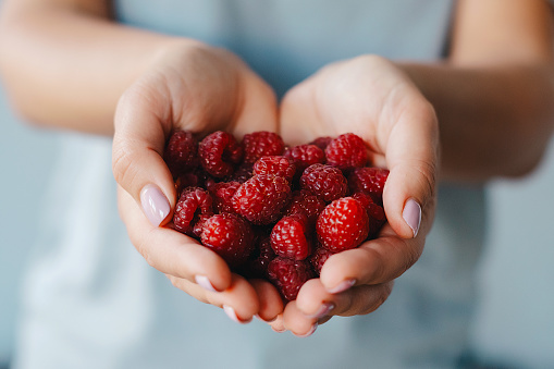 With just picked wild raspberries