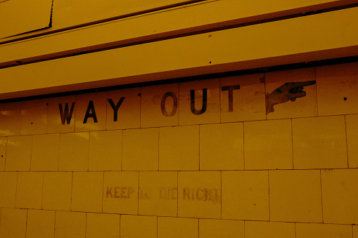 way out sign from subway