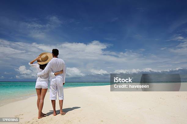 Couple On A Beach At Maldives Stock Photo - Download Image Now - Adult, Adults Only, Beach
