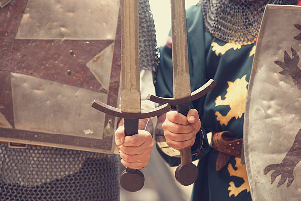 istock Two knights with swords and shields 179102171