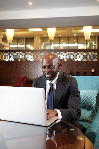 istock Business man working late in hotel bar 179102457