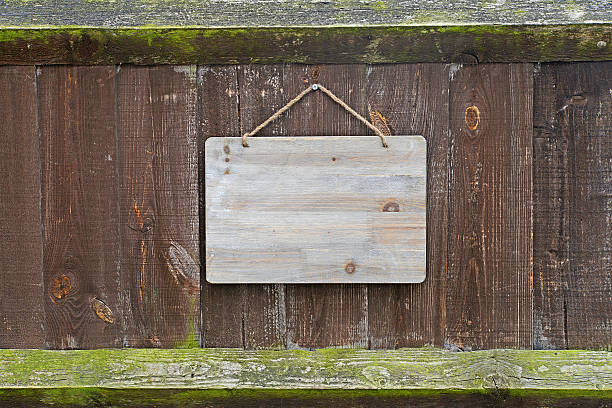istock Weathered old fence with board 179102562