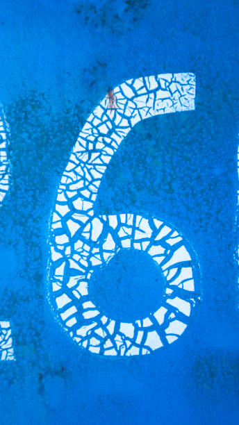istock Cracked paint number 6 on blue metal surface 1791026636