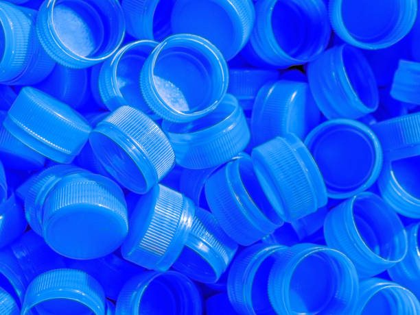 istock Top view Blue plastic bottle caps.Recycling collection and production processing plastic bottle caps background 1791029307