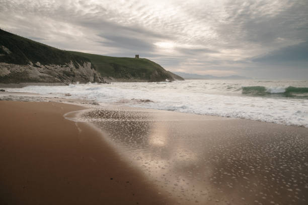 Tagle beach in Cantabria, Spain, at sunset