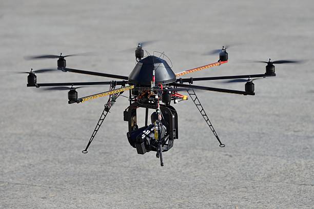 istock Police unmanned helicopter (UAV) with a camera for observation 179103066