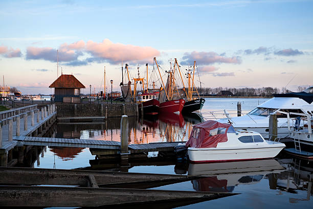 istock fishing ships at harbor, Zoutkamp 179104808