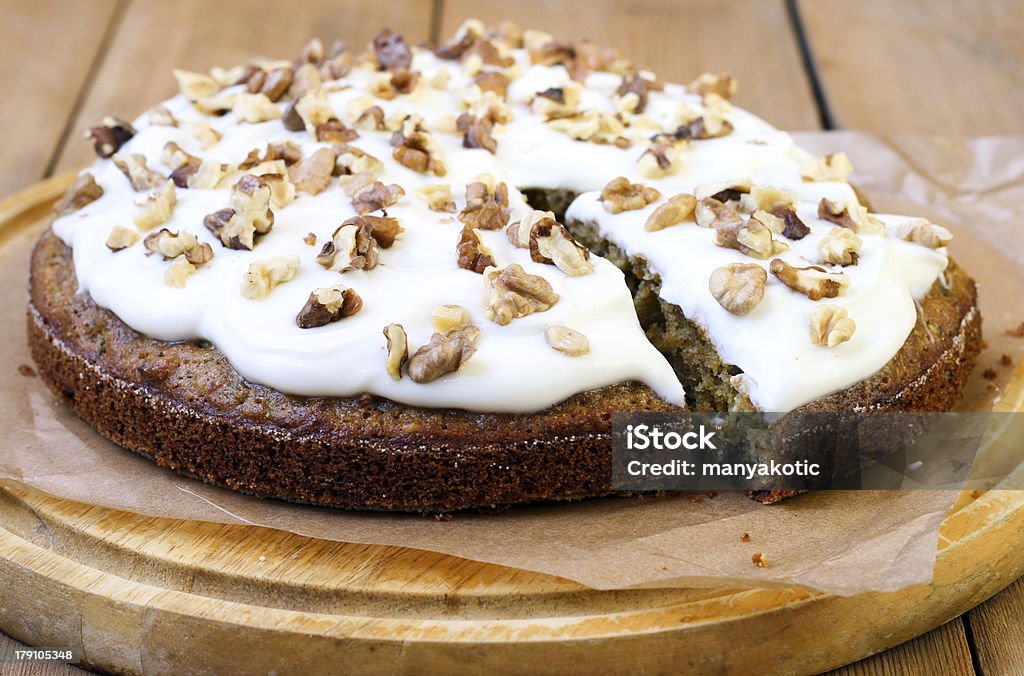 Carrot and courgette cake Carrot and courgette cake with nuts and raisin, with yogurt frosting Zucchini Stock Photo