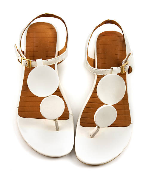 Vintage circles white flip flop sandals isolated on white background.