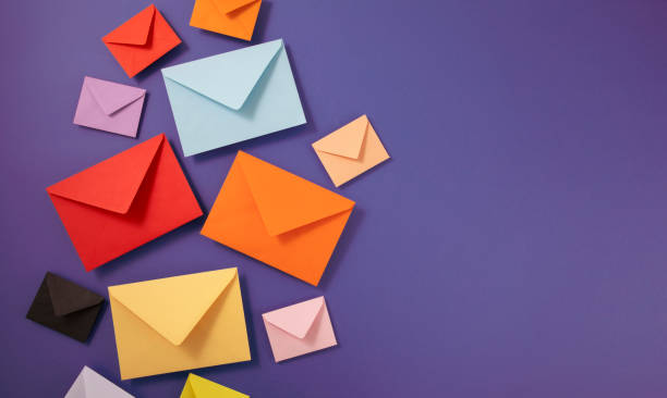 istock Colorful Envelopes on Purple Background 1791056918