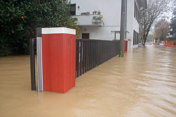 istock Streets and road invaded by mud during a flooding 3 179105995