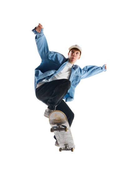 istock Sportive, active young man in casual clothes in motion, training with skateboard, doing stunts isolated over white background 1791060138
