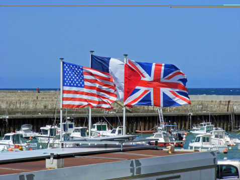 Flags at a harbor in Normandy