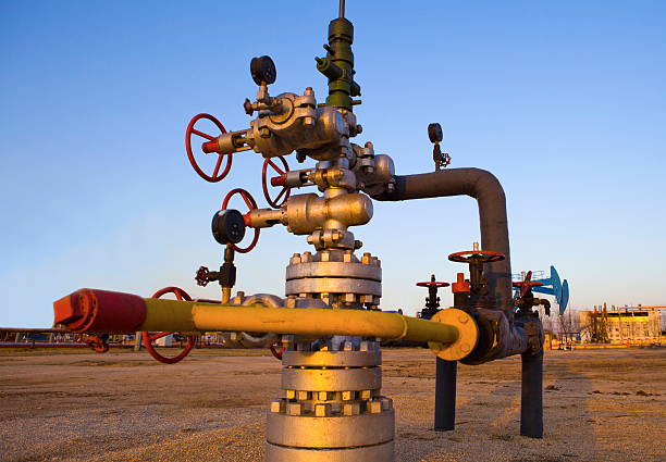 Oil Wellhead Oil Wellhead in the oil field wellhead stock pictures, royalty-free photos & images