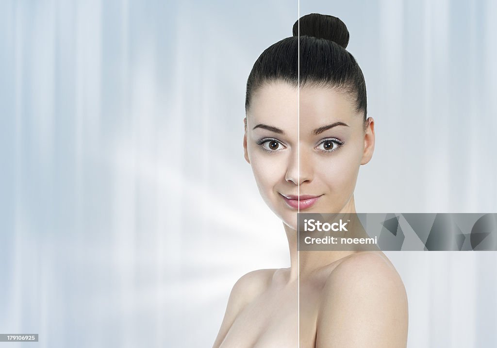 Beautiful young woman with half light /dark skin Beautiful young woman with half light half dark skin- whitening concept Skin Whitening Stock Photo