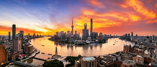 City financial district skyline panorama at sunrise in Shanghai, China