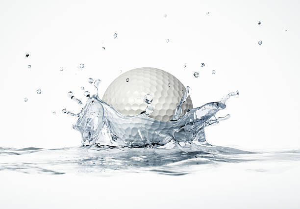 istock White golf ball splashing into water, forming a crown splash. 179107351