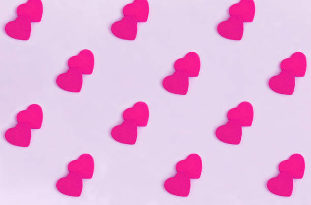 istock Background for Valentine's day. Pink hearts on the pink background. Flay lay. Pattern. 1791078059