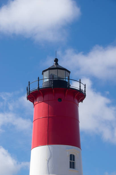 istock Top of Nauset Light with Clouds 1791080718