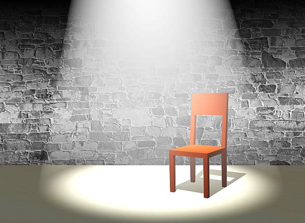 istock chair in spotlight 179108850