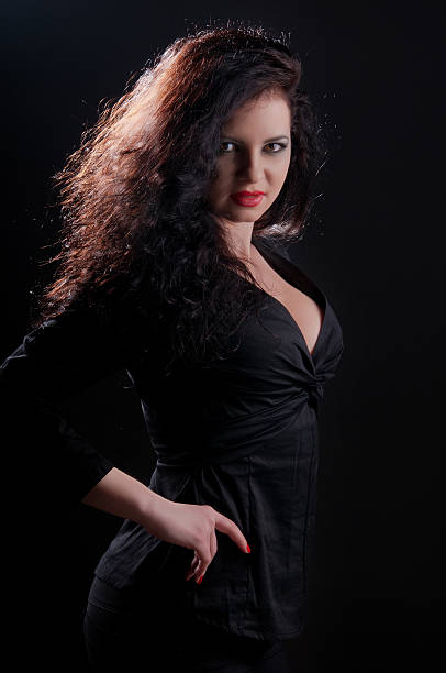istock desired brunette woman posing in leather corset 179110542