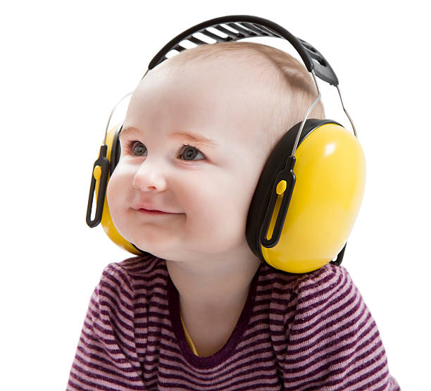 young child with ear protector stock photo