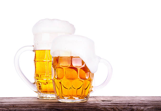 Beer glass on wooden table background Beer glass on old wooden table background isolated unbolted stock pictures, royalty-free photos & images