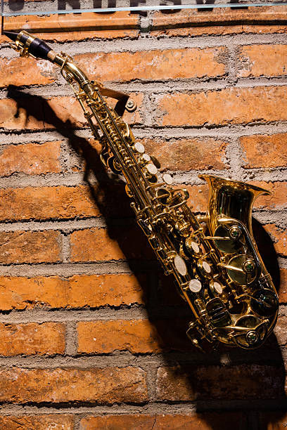 istock Saxophone is hanging on the wall 179111332